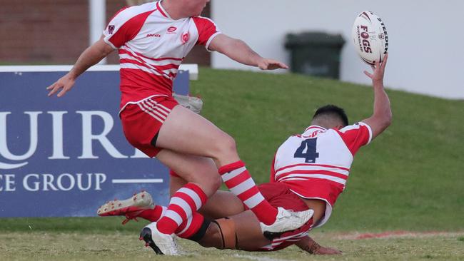 Langer Cup: PBC host St Mary's Toowoomba at Burleigh Bears Rugby League Club at Pizzey Park Miami. PBC's Daniel Butturini and Deine Mariner in a strange dance to try and score off a kick.. Picture Glenn Hampson