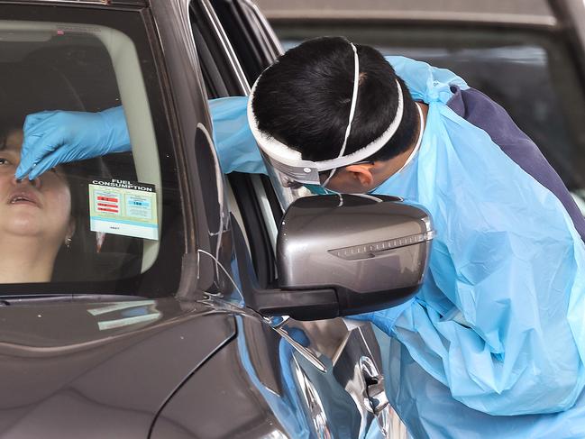 MELBOURNE, AUSTRALIA - NewsWire Photos NOVEMBER 17, 2020 : COVID-19 pop up test sites across Melbourne. A woman is tested at the Broadmeadows Hume City Council Carpark in MelbourneÃs north. Picture : NCA NewsWire / Ian Currie