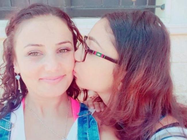 Amy Hazouri (left) with her sister Iman, was gunned down alongside her friend and client Lametta Fadlallah. Picture: Supplied