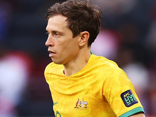 DOHA, QATAR - JANUARY 13: Craig Goodwin of Australia runs with the ball during the AFC Asian Cup Group B match between Australia and India at Ahmad Bin Ali Stadium on January 13, 2024 in Doha, Qatar. (Photo by Robert Cianflone/Getty Images)