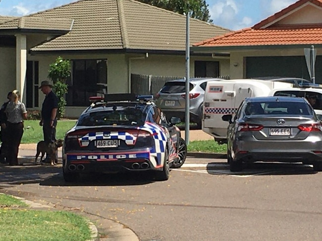 A dog seen outside the Elphinstone Dr home where a gunman held police to a 10-hour siege. Picture: Evan Morgan