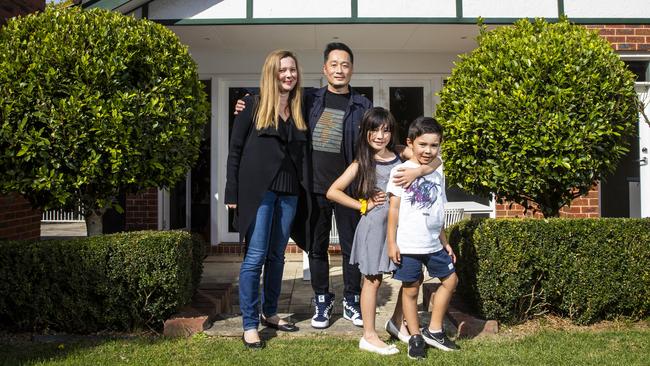 Sally and Geoff Kwan, with daughter Audrey and son Tommy, are selling their Box Hill South house to move to Camberwell. Picture: Aaron Francis