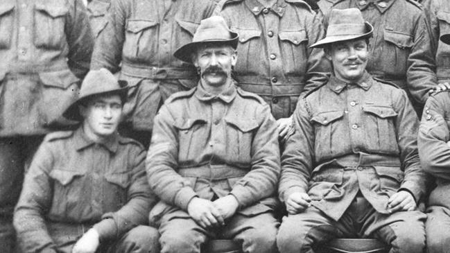 Group portrait of non-commissioned officers, 12th Field Company Engineers, 4th Australian Division. Back row, left to right: 5449 Lance Corporal (l Cpl) A Randall; 3312 2nd Corporal W Irwin; 5079 L Cpl GT Lawry; 149 L Cpl AT Burton; 5073 l Cpl PD Kennedy; 5632 L Cpl J N Button; 2518 L Cpl JC Sloper; 2966 L Cpl WR Aexander; 2472 LCpl GT Cooper; 4238 L Cpl G Redman; 5067 L Cpl CA Guildford; 3356 2nd Cpl TB Hills. Middle row: 5638 L Cpl R Edwards; 3068 2nd Cpl A Easy; 374 Corporal W Simpson; 2991 2nd Cpl EC Cox; 3019 Cpl A Fry; 3122 Cpl MS Seddon; 2020 Cpl C Bowd; 378 Cpl DC Stewart; 5437 Cpl W Fleming; 2817 2nd Cpl HN Sarina; 5456 2nd Cpl CD Stewart. Front row: 6211 L Cpl AE Dean; 5461 Sergeant (Sgt) WHG Wakeham; 5463 Sgt T W Whitehead; 209 Company Quartermaster-Sergeant W Cridland; 3 Warrant Officer Class 1 A Thomson; 11 Farrier Sergeant J Longmore; 3352 Sgt WH Lister; 2525 Sgt E Wilkinson; 308 Cpl GE Gabreil. Absentees: 2964 L Cpl HC Armstrong; 2984 Sgt AE Cother; 2998 2nd Cpl HG Willey; 2069 L Cpl J Parker.  Picture: Australian War Memorial.