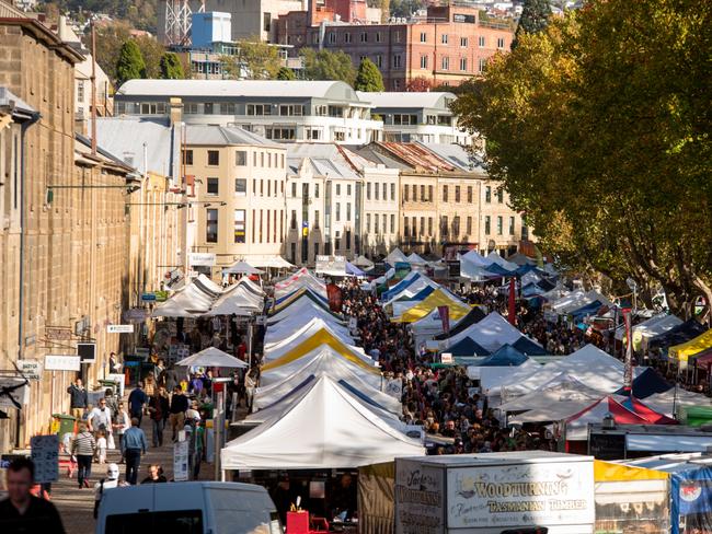 Set among the historic Georgian sandstone buildings of Salamanca Place in Hobart, this famous market attracts thousands of locals and visitors every Saturday of the year.Photo - Alastair BettESCAPE 15 May 2022TOP GEAR