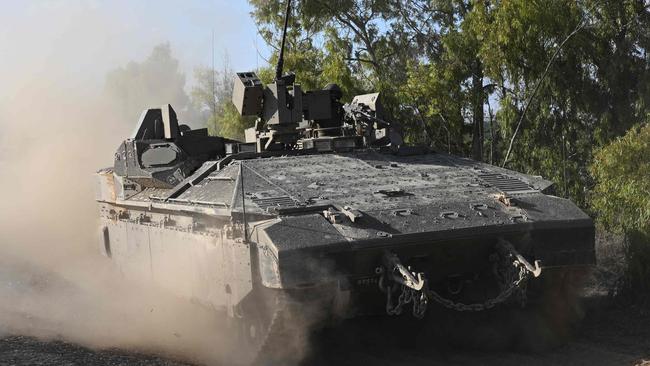 An Israeli tank rolls towards the border with the Gaza Strip. Picture: AFP