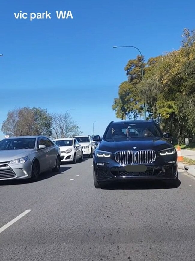 The driver of the car lifted his hands at the driver ahead of them. Picture: TikTok