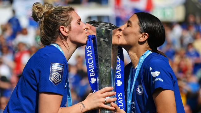 Millie Bright and Sam Kerr of Chelsea kiss the Barclays Women's Super League trophy Picture: Getty Images