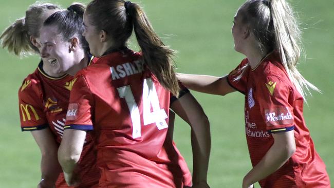 Teenage talent Chelsie Dawber celebrates her maiden W-League goal with Adelaide United teammates. Picture: Kelly Barnes/Getty Images