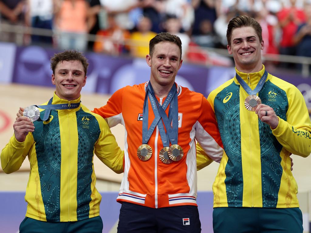 Gold medallist Harrie Lavreysen of Team Netherlands with Australia’s silver medallist Matthew Richardson and bronze medallist Matthew Glaetzer on the podium at Saint-Quentin-en-Yvelines Velodrome on August 11. Picture: Jared C. Tilton/Getty Images