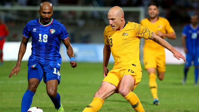 Socceroos midfielder Aaron Mooy in action against Kuwait. The temperature was 38C at kick-off. Picture: Getty Images