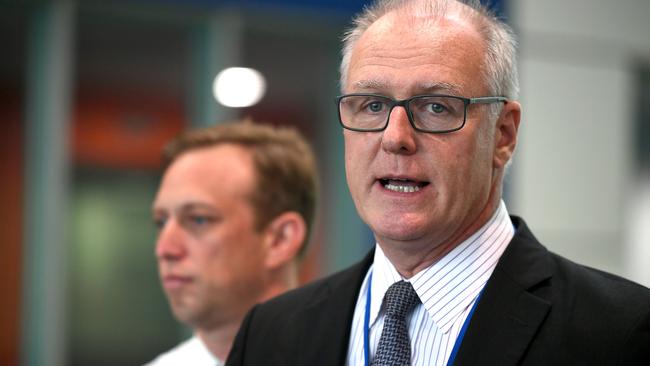 Queensland Health director-general Dr John Wakefield (front) with Health Minister Steven Miles, speaking at a news conference regarding the state’s seven new COVID-19 cases. Photo: John Gass/AAP