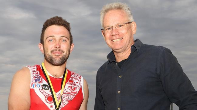 Federal captain Abe Ankers with AFLNT chairman Sean Bowden after winning the 2023 CAFL grand final. Picture: AFLNT Media