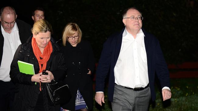 Environment Minister Ian Hunter walks up Ash Ave in Clovelly Park with other door-knockers to inform residents they will have to move. Picture: Tom Huntley