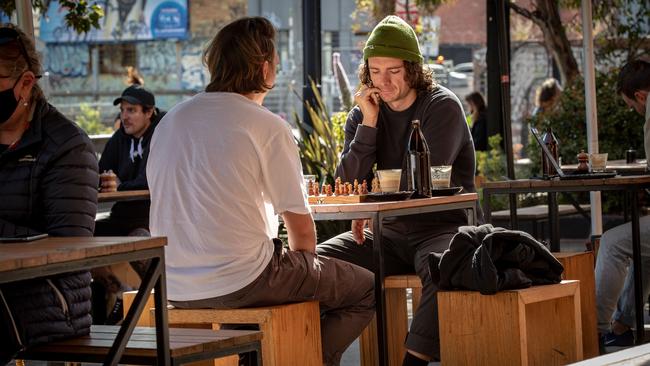 Restaurants, cafes and pubs will see an increase to venue caps both indoors and outdoors. Picture: Darrian Traynor/Getty Images.