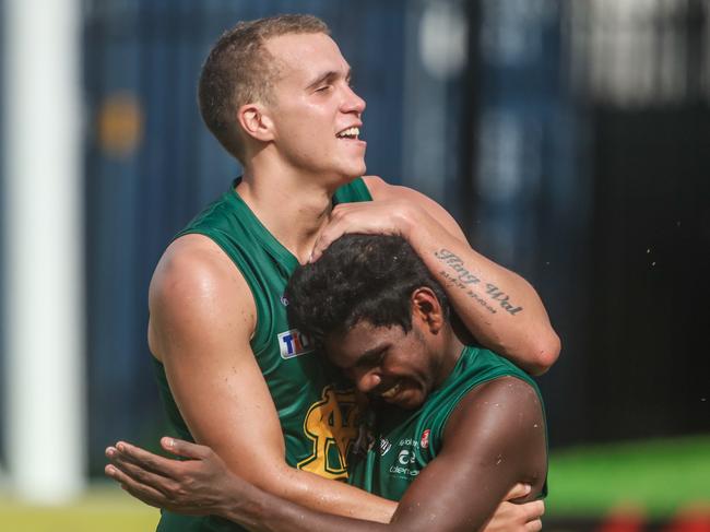 Maurice Rioli Jr celebrates his late 4th quarter goal with Shaun Edwards as St Mary's v Sthn Districts Men's Premier League at TIO Stadium.Picture GLENN CAMPBELL