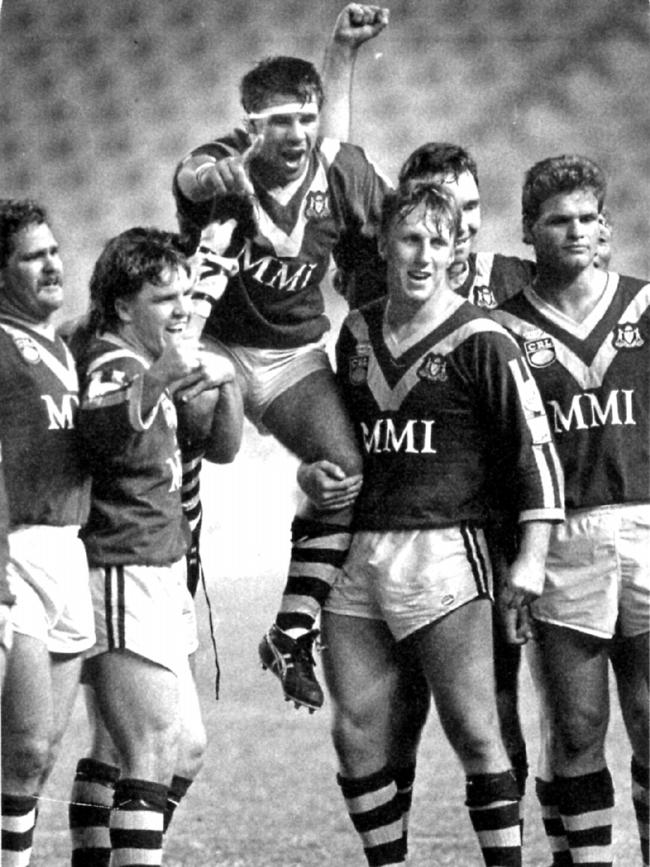 Trevor Crow being lifted up by team mates in 1992.