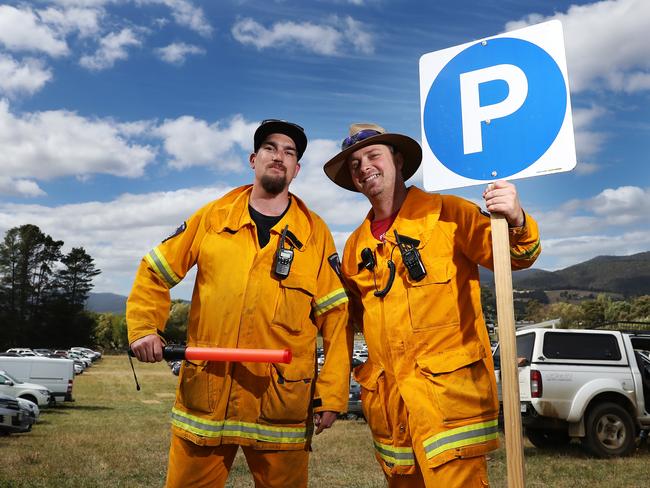 New Geeveston Fire Brigade recruits Dean Boyd, of Port Huon, left, and Brendan Walker, of Geeveston, who helped direct traffic. Picture: NIKKI DAVIS-JONES