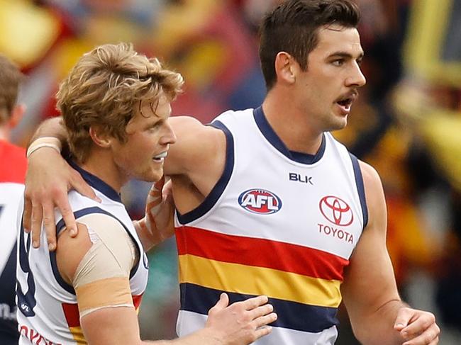 MELBOURNE, AUSTRALIA - JULY 03: Rory Sloane (left) and Taylor Walker of the Crows celebrate during the 2016 AFL Round 15 match between the Melbourne Demons and the Adelaide Crows at the Melbourne Cricket Ground on July 3, 2016 in Melbourne, Australia. (Photo by Michael Willson/AFL Media/Getty Images)