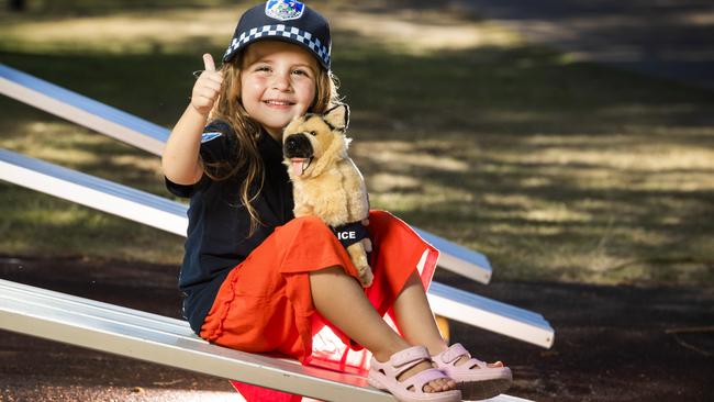 Harper was presented with a hat and a dog toy from police. Picture: Nigel Hallett.