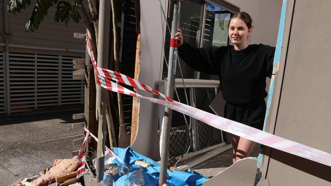 A stolen HiLux crashed through 19-year-old Teiah Millar's lounge room wall at Kangaroo Point. Picture: Liam Kidston.