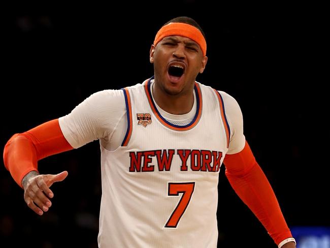 NEW YORK, NY - FEBRUARY 12: Carmelo Anthony #7 of the New York Knicks reacts after he is called for a foul in the fourth quarter against the San Antonio Spurs at Madison Square Garden on February 12, 2017 in New York City. NOTE TO USER: User expressly acknowledges and agrees that, by downloading and or using this Photograph, user is consenting to the terms and conditions of the Getty Images License Agreement   Elsa/Getty Images/AFP == FOR NEWSPAPERS, INTERNET, TELCOS & TELEVISION USE ONLY ==