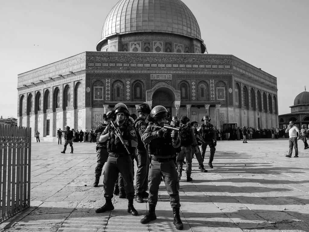 Israeli security forces hold position as they stand guard in front of the Dome of the Rock in the Haram al-Sharif compound in the old city of Jerusalem. Picture: AFP