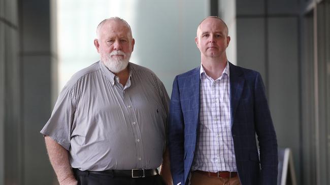 Childers survivor Richard Tempest (right) and Bundaberg deputy mayor Bill Trevor (left) who handed over letters to the parole board president Michael Byrne. Pic Peter Wallis