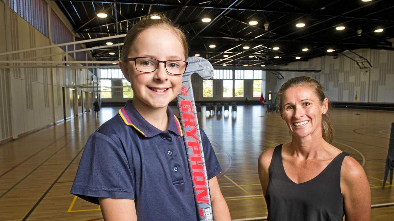 NEW CENTRE: Kate Roper (left) celebrates the opening of the school's new sports centre with former The Glennie School student and ex-Hockeyroo Angie Lambert. Picture: Nev Madsen