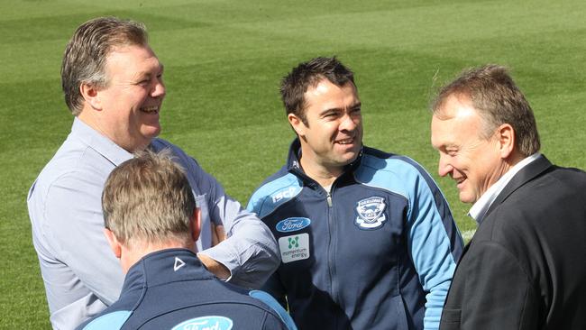 Neil Balme and Brian Cook with Chris Scott after his appointment in the top job in 2010.