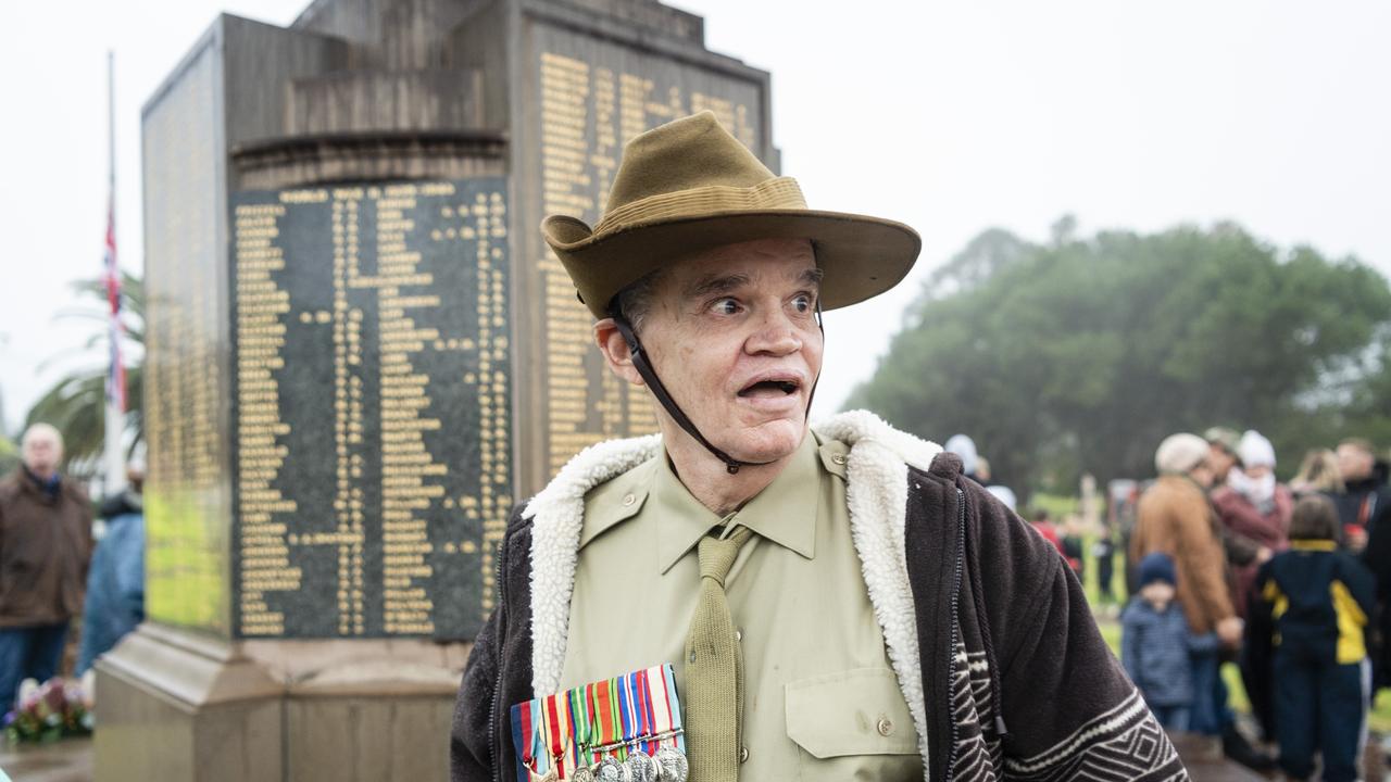 Gordon Seymour wears his dad's Barney Seymour's WWII medals at the Mothers' Memorial at the conclusion of the Anzac Day Toowoomba Dawn Service, Tuesday, April 25, 2023. Picture: Kevin Farmer