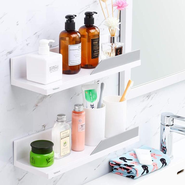 Add more storage space to your bathroom with these floating shelves.