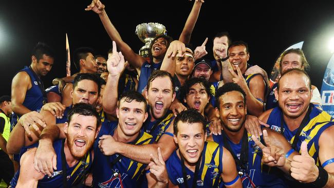 Wanderers celebrate their win of the grand final against St Mary’s.