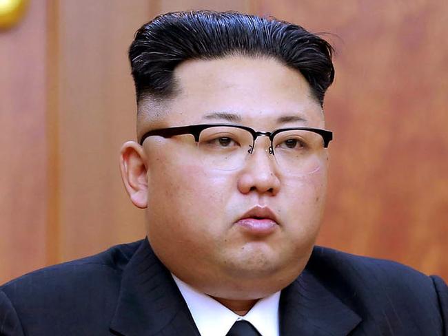 A handout picture released by North Korean news agency, KCNA (Korean Central News Agency) on January 1, 2017 shows North Korean leader Kim Jong-Un delivering the new year message in Pyongyang. / AFP PHOTO / KNCA / STRINGER