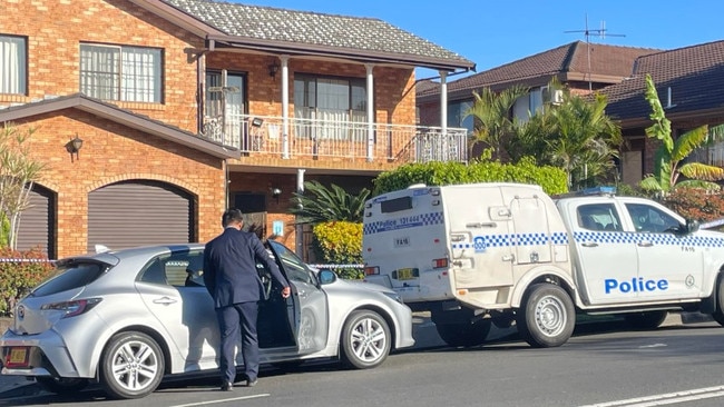 Police at the crime scene on Friday morning. Picture: Madeline Crittenden