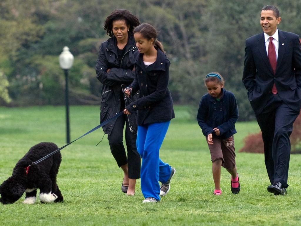 The Obamas (with first dog, Bo) at the White House in 2009. Picture: AFP