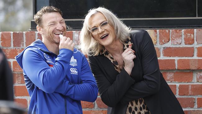 Danielle Laidley with Brent Harvey in 2021 as the Kangaroos celebrate being debt-free. Picture: Alex Coppel.