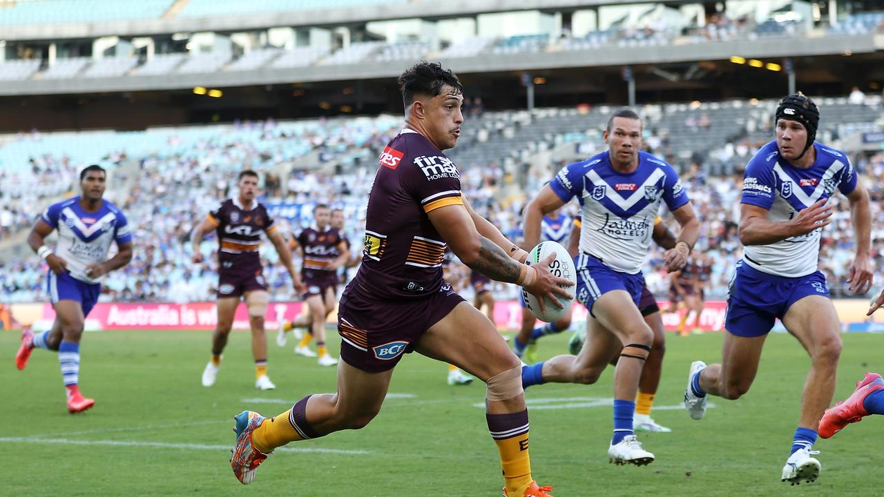 SYDNEY, AUSTRALIA - MARCH 20: Kotoni Staggs of the Broncos runs the ball during the round two NRL match between the Canterbury Bulldogs and the Brisbane Broncos at Accor Stadium, on March 20, 2022, in Sydney, Australia. (Photo by Mark Kolbe/Getty Images)