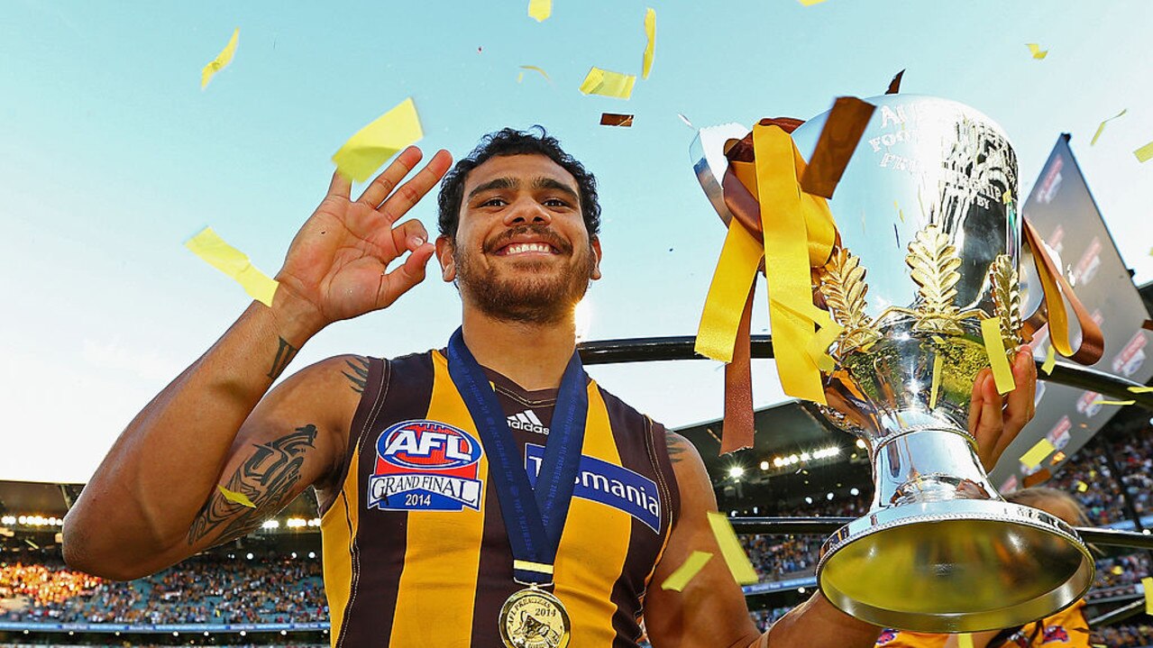 Cyril with the 2014 premiership cup (Photo by Quinn Rooney/Getty Images)