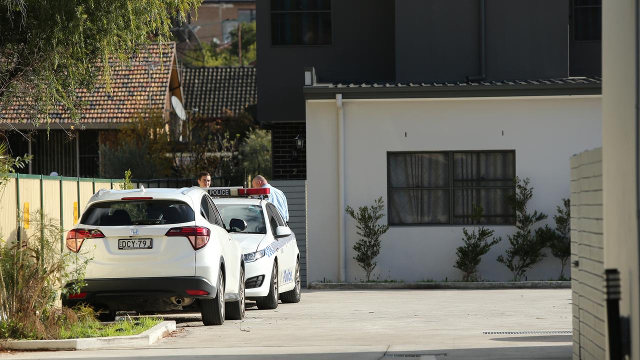 Police the home of Qi Yu in Campsie. Picture: Richard Dobson