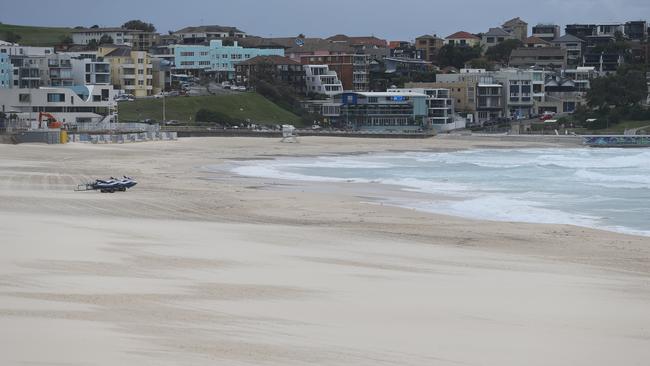 The beach is now closed and remains empty. Picture Rohan Kelly