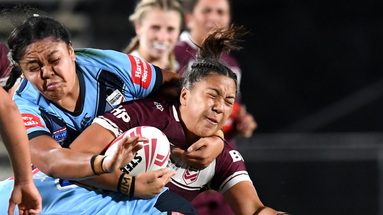 Shannon Mato is stopped in her tracks by the Blues defence.