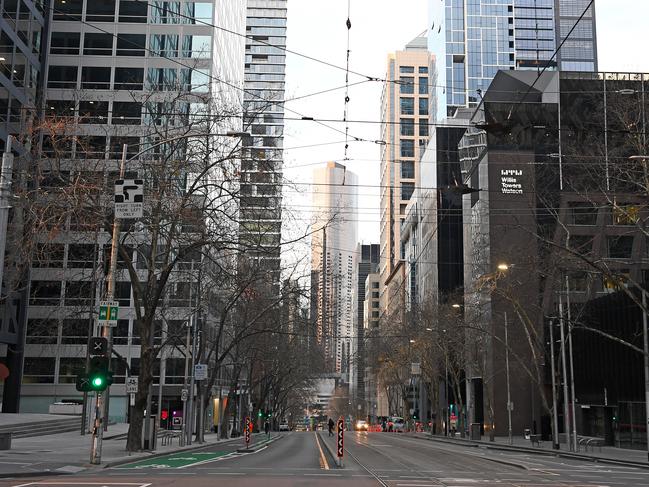 MELBOURNE, AUSTRALIA - AUGUST 11: Empty streets are seen on August 11, 2020 in Melbourne, Australia.  Metropolitan Melbourne is under stage 4 lockdown restrictions, with people only allowed to leave home to give or receive care, shopping for food and essential items, daily exercise and work, while an overnight curfew from 8pm to 5am is also in place. The majority of retail businesses are also closed. Other Victorian regions are in stage 3 lockdown. The restrictions, which came into effect from 2 August, have been introduced by the Victorian government as health authorities work to reduce community COVID-19 transmissions across the state. (Photo by Quinn Rooney/Getty Images)