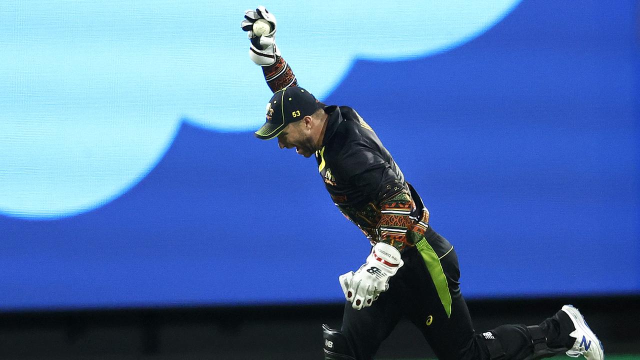 Matthew Wade celebrates his catch to dismiss Virat Kohli. Picture: Phil Hillyard