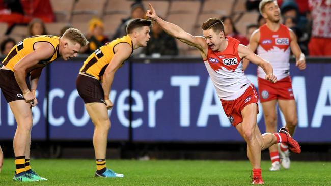 Remarkable rookie Ben Ronke celebrates after kicking his sixth major last night against the Hawks at the MCG. Picture: AAP