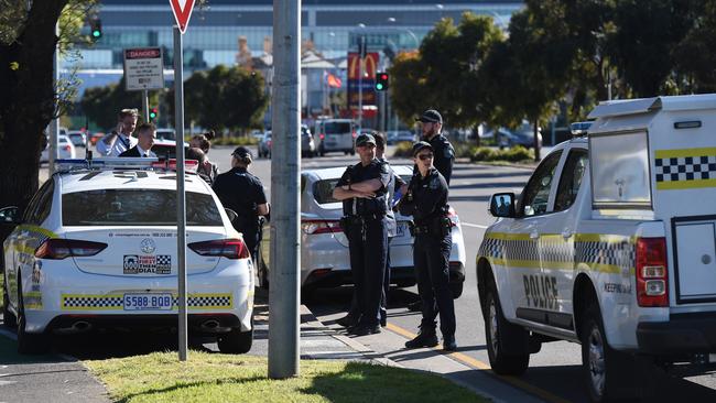 Police at Adelaide High School on West Terrace after a man was left in a critical condition after allegedly being assaulted by four men. Picture: Naomi Jellicoe