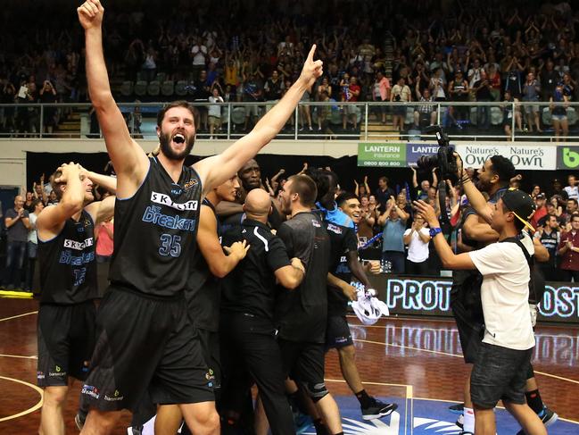 Action from the National Basketball League (NBL) grand final match between the Cairns Taipans and the New Zealand Breakers, held at North Shore Events Centre, Auckland. Breakers' Alex Pledger salutes the crowd after this team's amazing win. Picture: Brendan Radke.