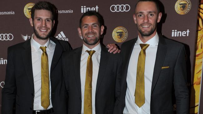 (from left) Grant Birchall, Luke Hodge and Jack Gunston at the Hawthorn best-and-fairest. Picture: Andrew Henshaw