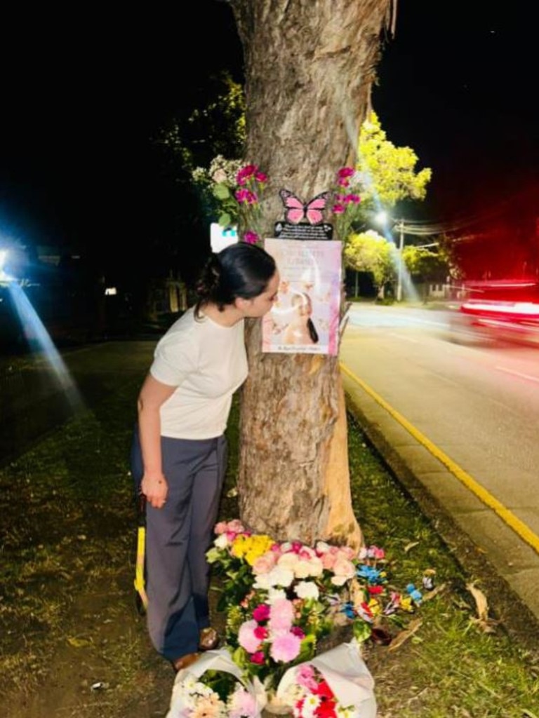 A memorial that family members of Charlotte O'Brien placed outside of the Santa Sabina School. The school took the memorial down.