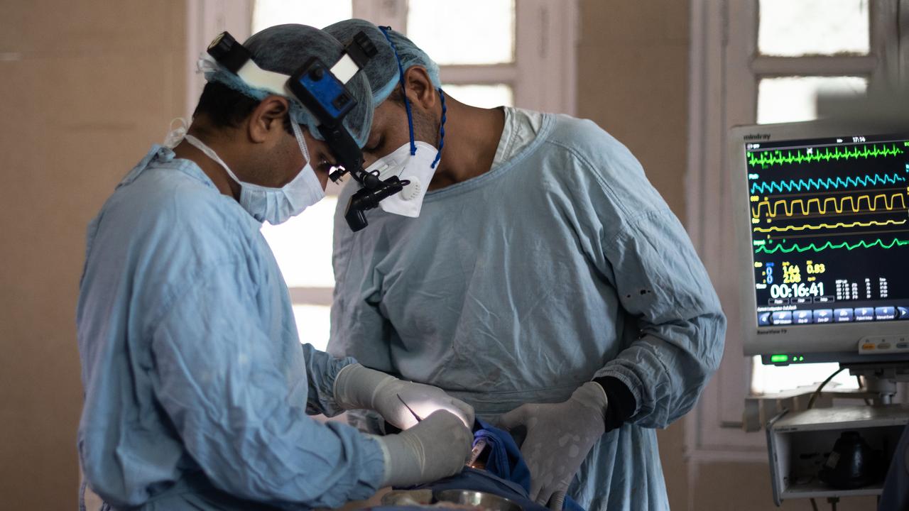 Members of an Indian surgical team perform surgery to remove a fungal infection from a patient suffering from mucormycosis. Picture: Rebecca Conway/Getty Images