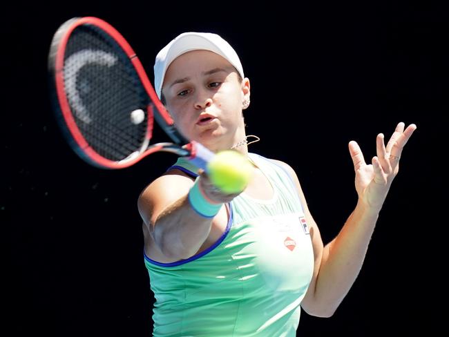 Ashleigh Barty of Australia plays a return shot during her fifth round match against Petra Kvitova of the Czech Republic on day nine of the Australian Open tennis tournament at Rod Laver Arena in Melbourne, Tuesday, January 28, 2020. (AAP Image/Dave Hunt) NO ARCHIVING, EDITORIAL USE ONLY